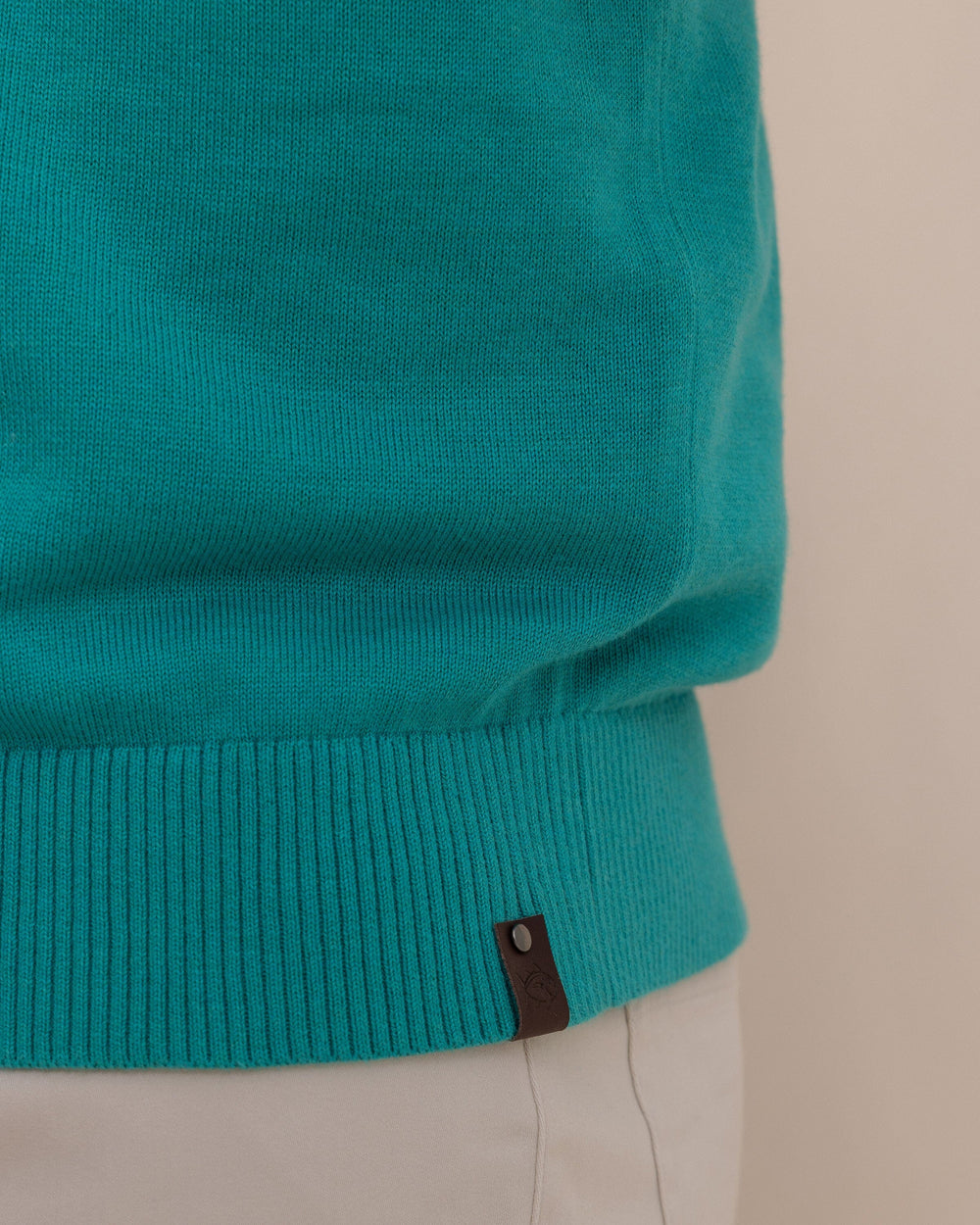 The detail view of the Southern Tide Whitehaven Heather Quarter Zip Sweater by Southern Tide - Heather Spruce Shade