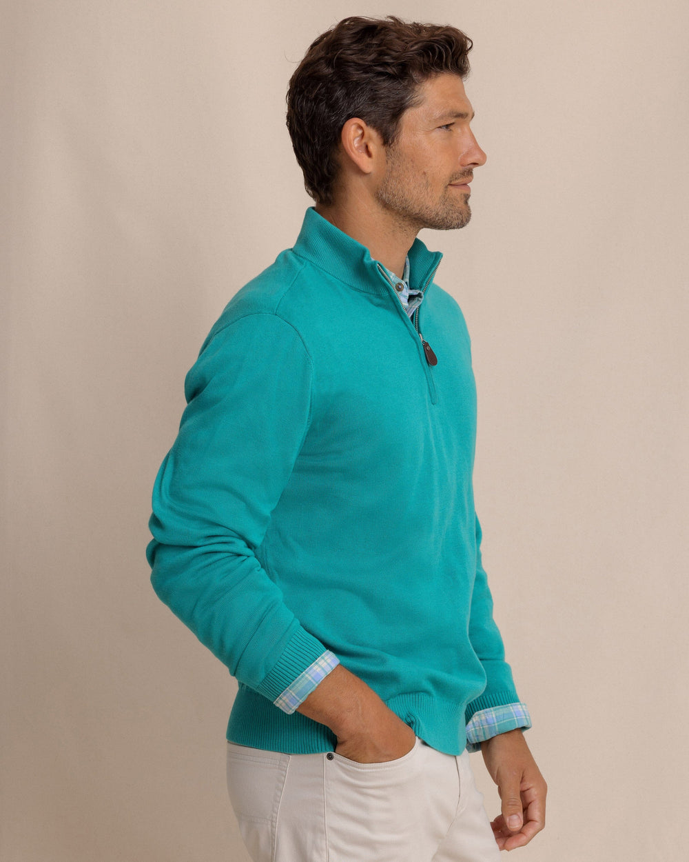 The side view of the Southern Tide Whitehaven Heather Quarter Zip Sweater by Southern Tide - Heather Spruce Shade