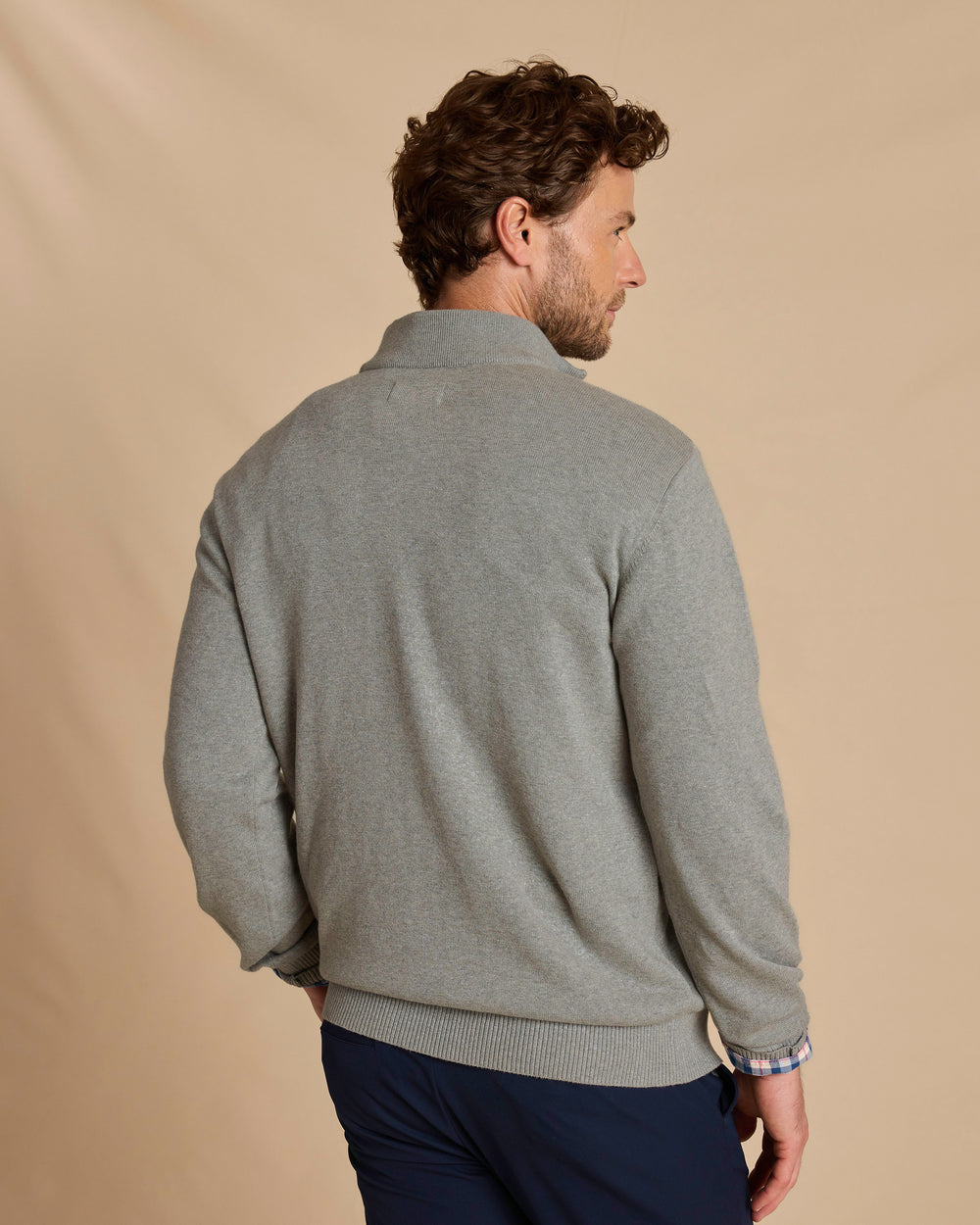 The back view of the Southern Tide Whitehaven Heather Quarter Zip Sweater by Southern Tide - Heather Storm Grey