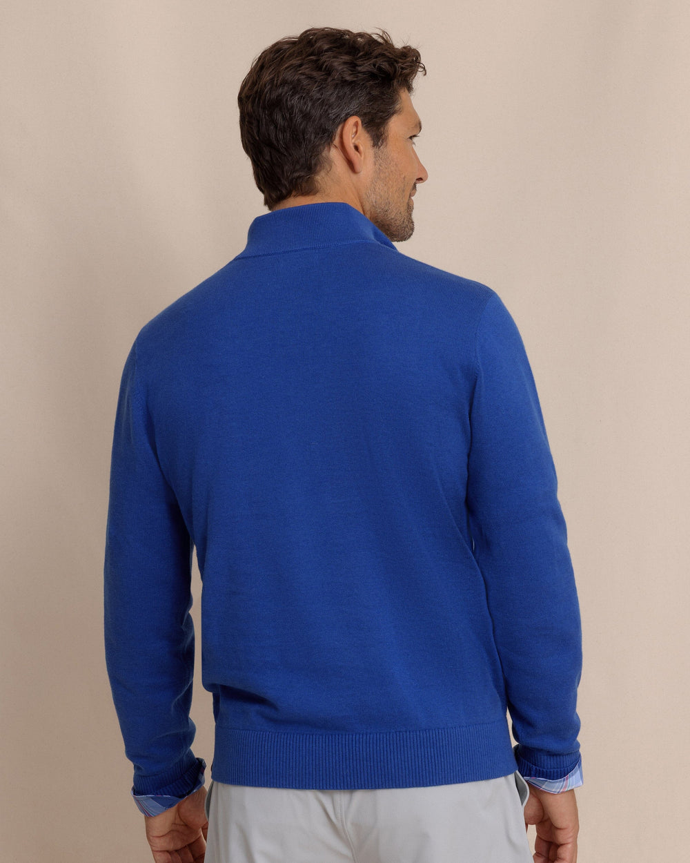 The back view of the Southern Tide Whitehaven Heather Quarter Zip Sweater by Southern Tide - Heather Surf Blue