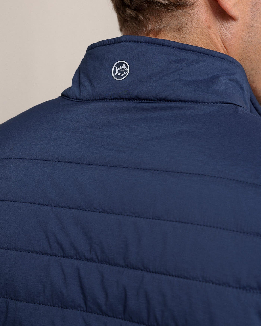 The back view of the Southern Tide Whitemarsh Packable Quilted Vest by Southern Tide - Dress Blue