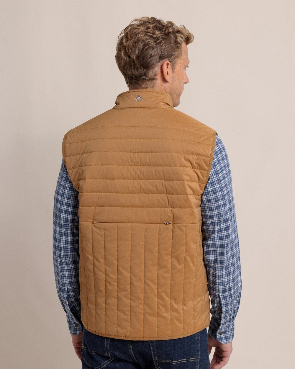 The back view of the Southern Tide Whitemarsh Packable Quilted Vest by Southern Tide - Hazelnut Khaki