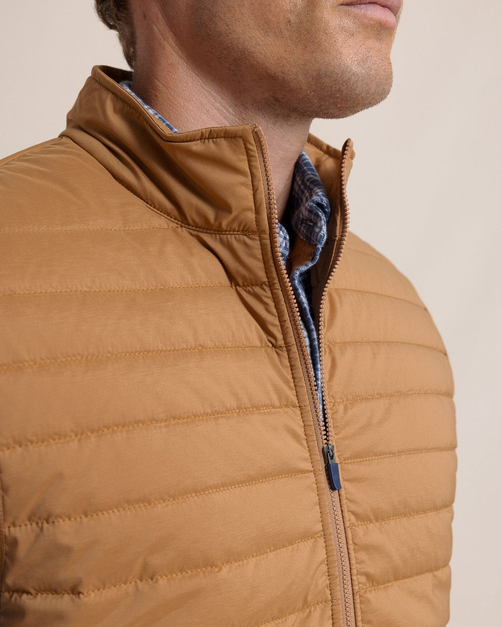 The collar view of the Southern Tide Whitemarsh Packable Quilted Vest by Southern Tide - Hazelnut Khaki