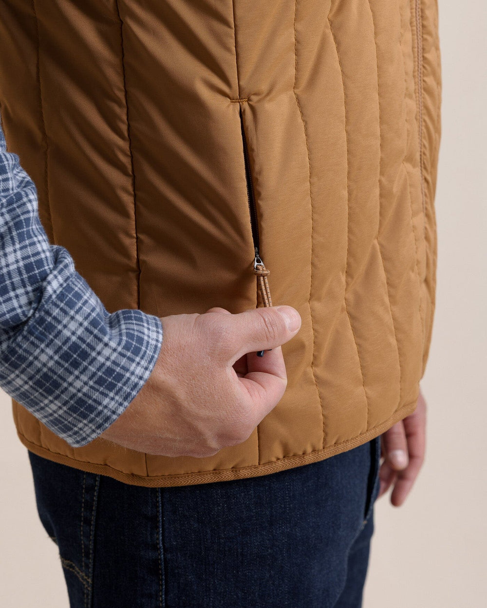 The pocket view of the Southern Tide Whitemarsh Packable Quilted Vest by Southern Tide - Hazelnut Khaki