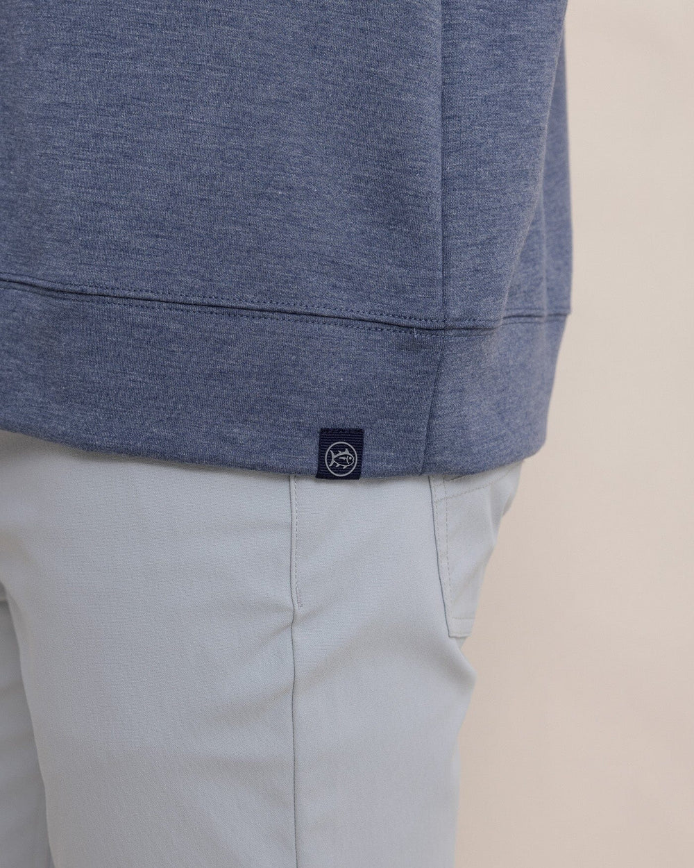 The hem view of the Southern Tide Whyche Interlock Heather Quarter Zip by Southern Tide - Heather Dress Blue