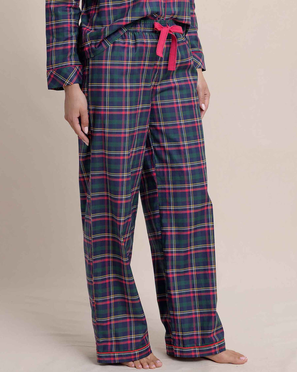 The side view of the Southern Tide Women's Partridgeberry Plaid Lounge Pants by Southern Tide - Dress Blue