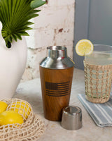 The lifestyle view of the Southern Tide Wood Pattern 20oz Cocktail Shaker by Southern Tide - Natural