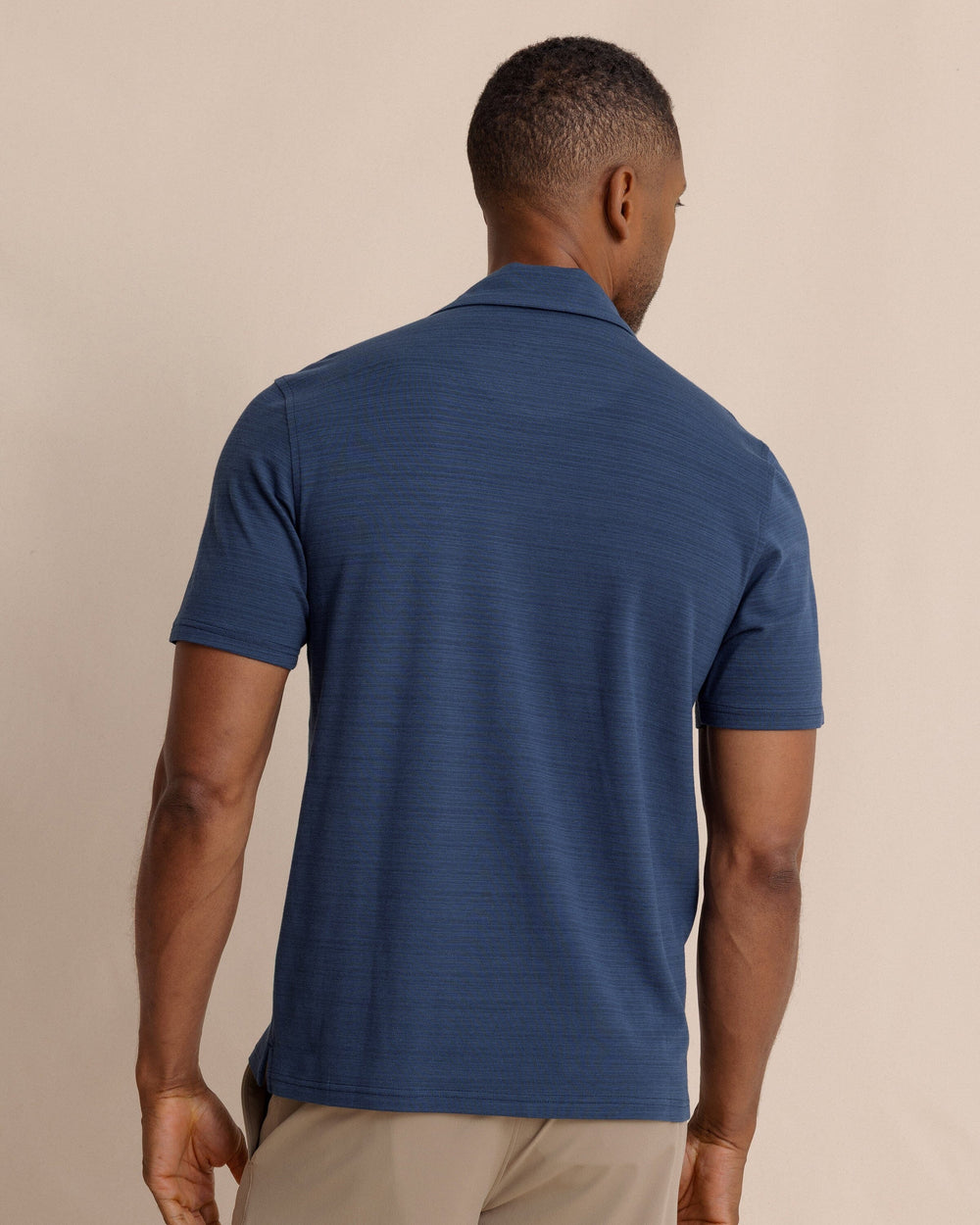 The back view of the Southern Tide Woodland Covered Placket Polo by Southern Tide - Dress Blue