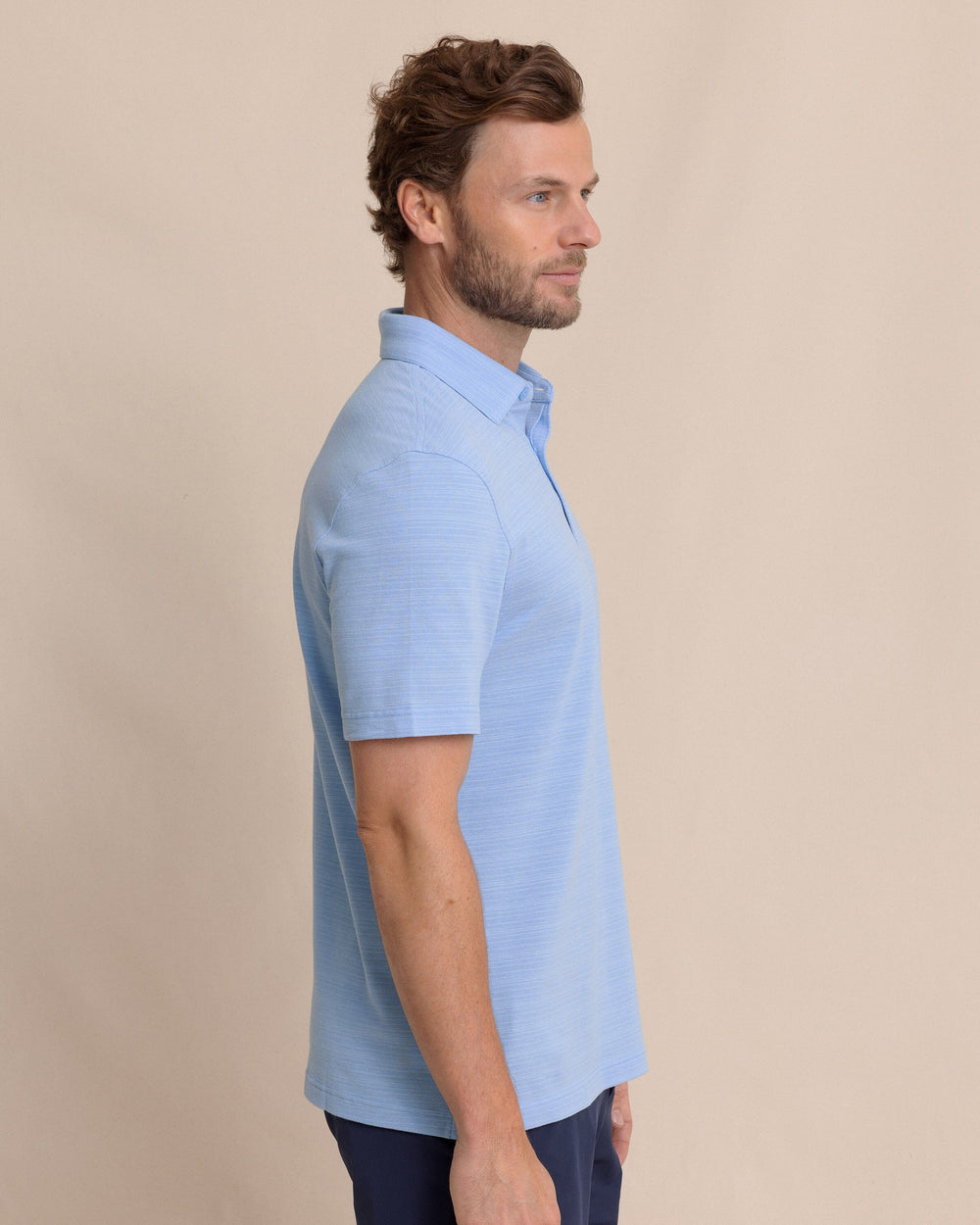 The side view of the Southern Tide Woodland Covered Placket Polo by Southern Tide - Ocean Channel