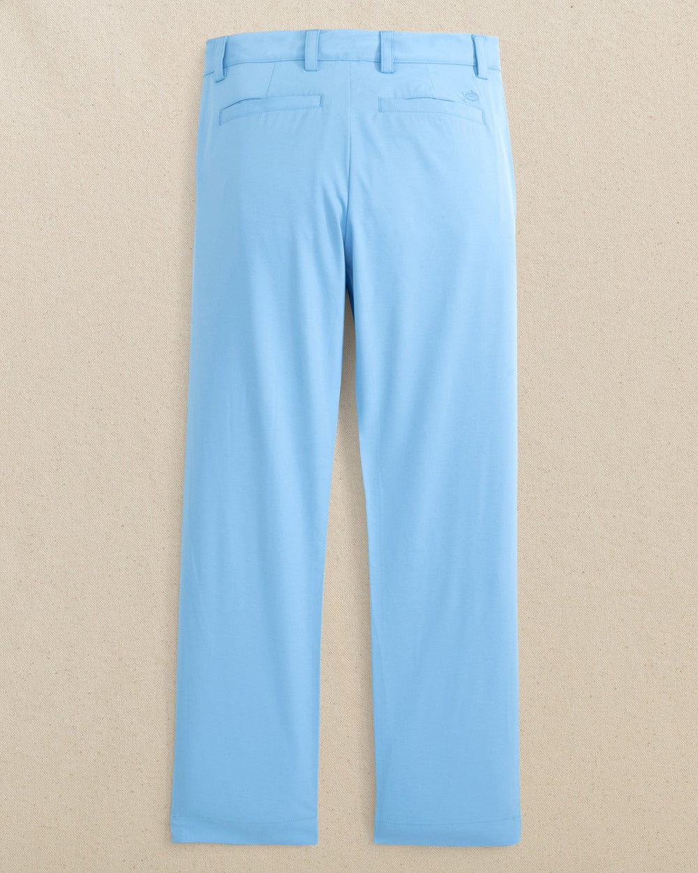 The back view of the Youth Leadhead Performance Pant by Southern Tide - Ocean Channel