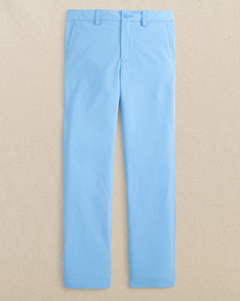 The front view of the Youth Leadhead Performance Pant by Southern Tide - Ocean Channel
