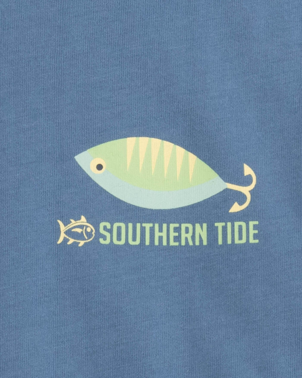 The detail view of the Southern Tide Youth Skipjack Lure Fill Short Sleeve T-shirt by Southern Tide - Coronet Blue