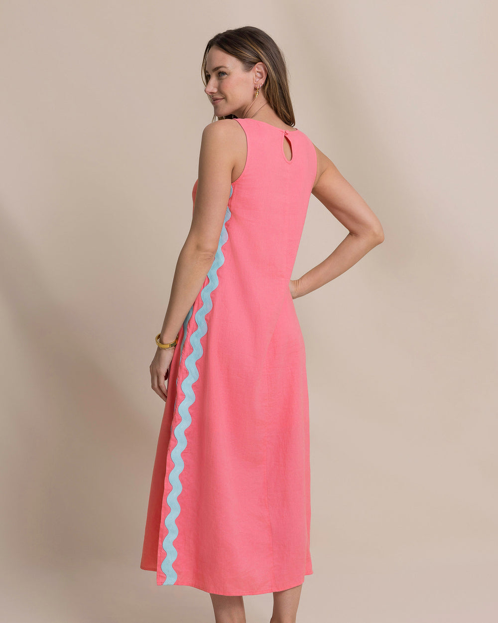 The back view of the Southern Tide Zalia Side Stripe Maxi Dress by Southern Tide - Island Pink