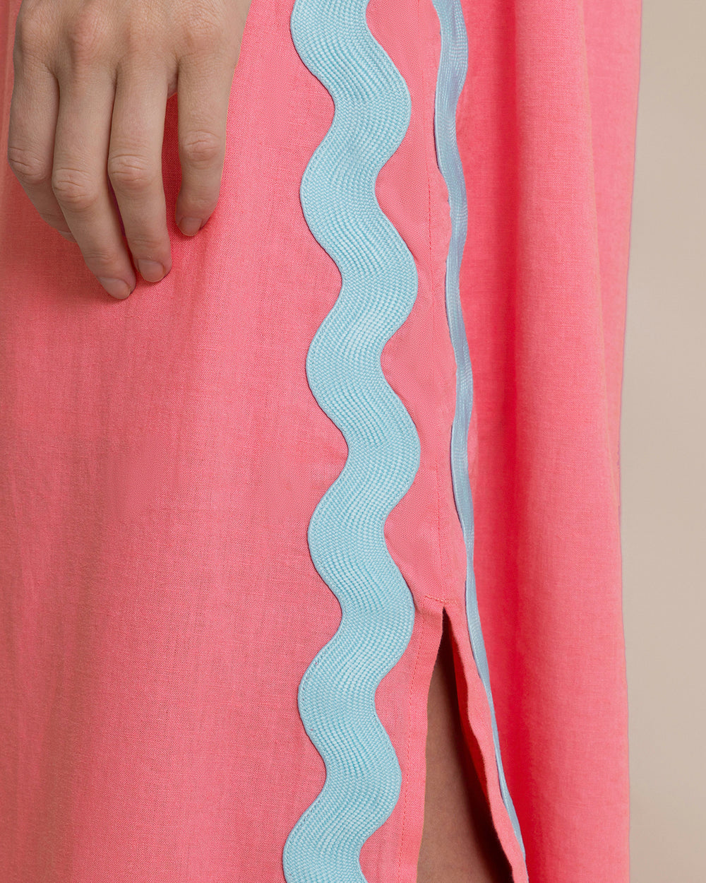 The detail view of the Southern Tide Zalia Side Stripe Maxi Dress by Southern Tide - Island Pink