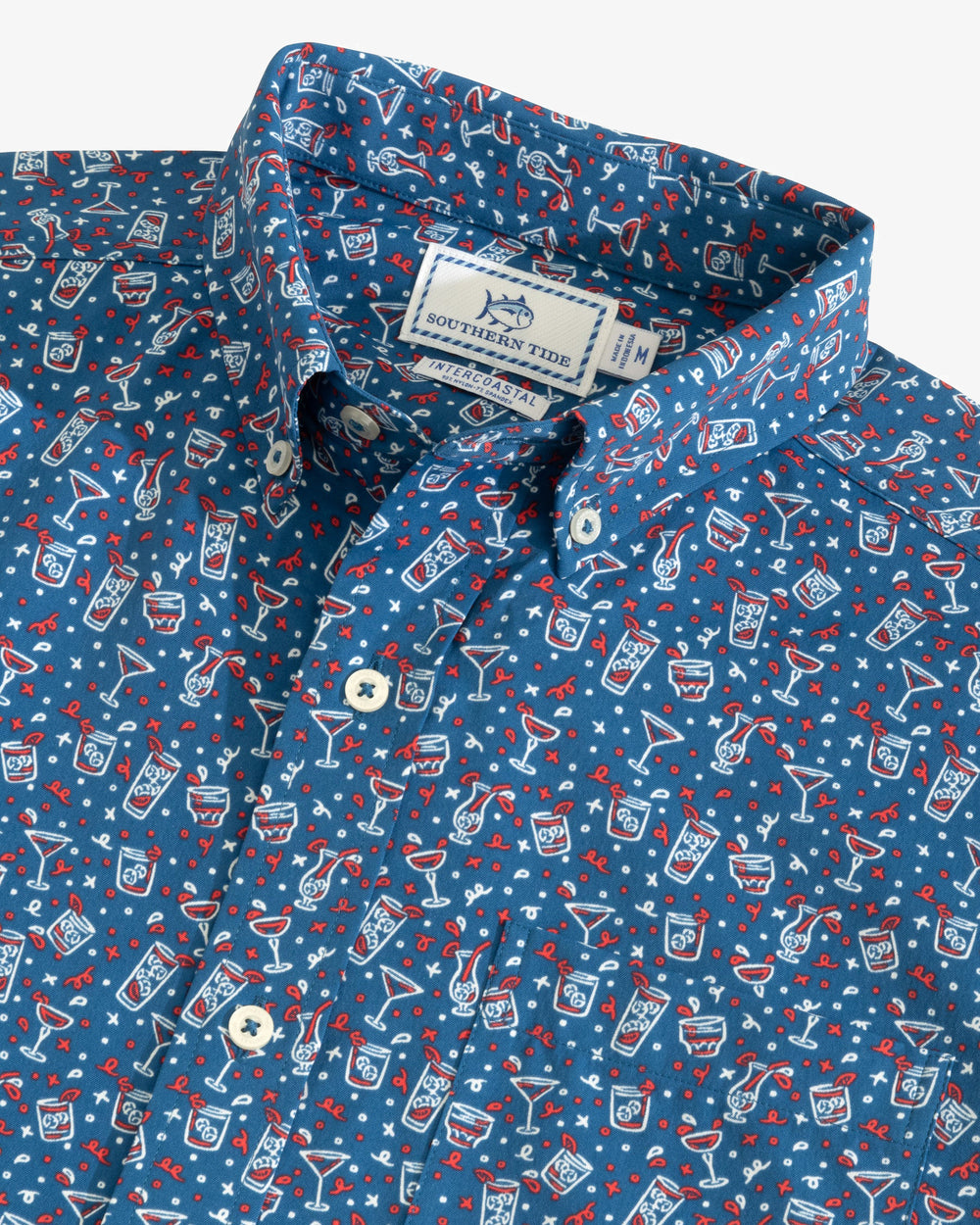 The detail view of the Men's Let the Party Be-Gin Short Sleeve Button Down Shirt by Southern Tide - Deep Water