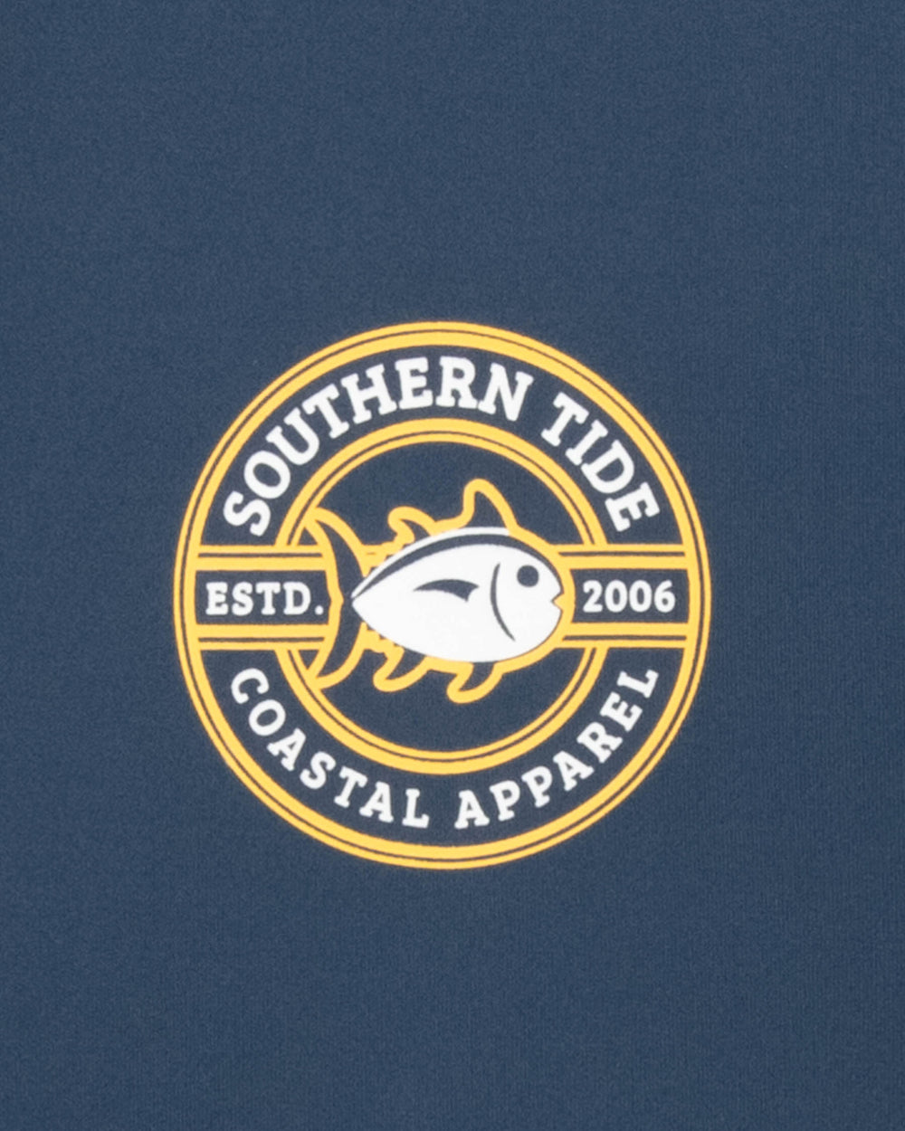 The detail view of the Antique Driving Helmet Performance Long Sleeve T-Shirt by Southern Tide - Dark Denim