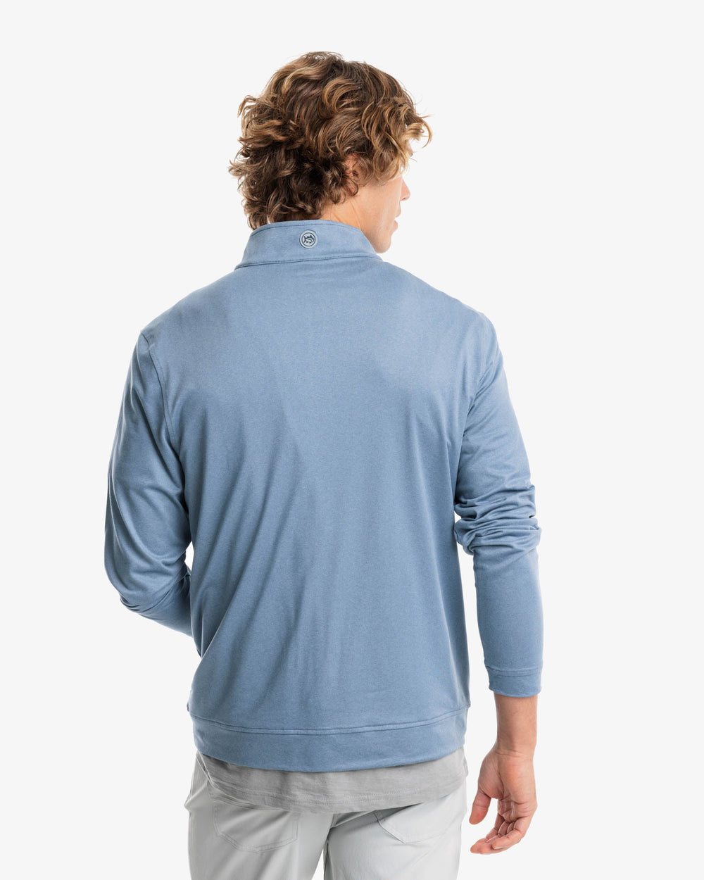 The back view of the Backbarrier Heather Performance Quarter Zip Pullover by Southern Tide - Heather Blue Haze