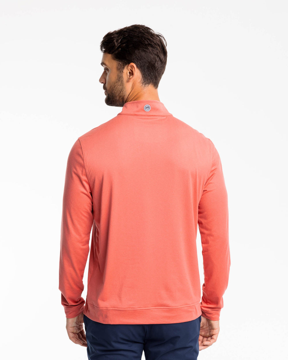 The back view of the Backbarrier Heather Performance Quarter Zip Pullover by Southern Tide - Heather Mineral Red