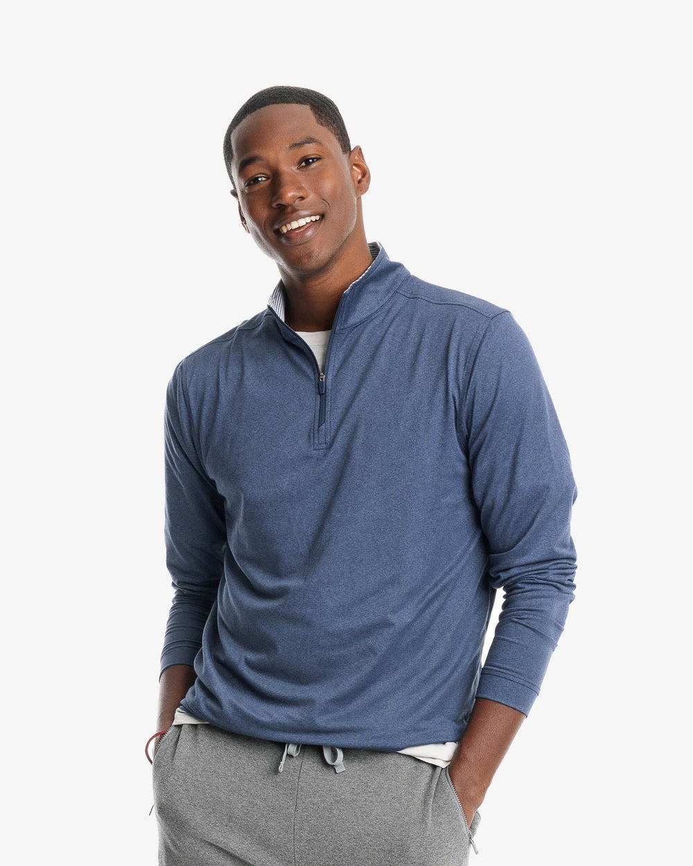 The front view of the Backbarrier Heather Performance Quarter Zip Pullover by Southern Tide - Heather True Navy