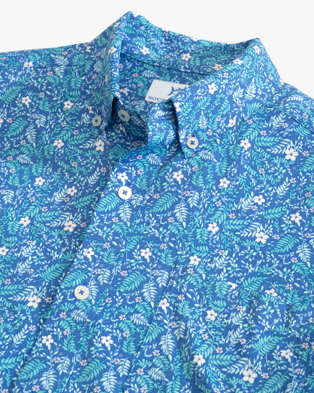 The detail view of the Southern Tide Barely Botanical Intercoastal Short Sleeve Button Down Shirt by Southern Tide - Atlantic Blue