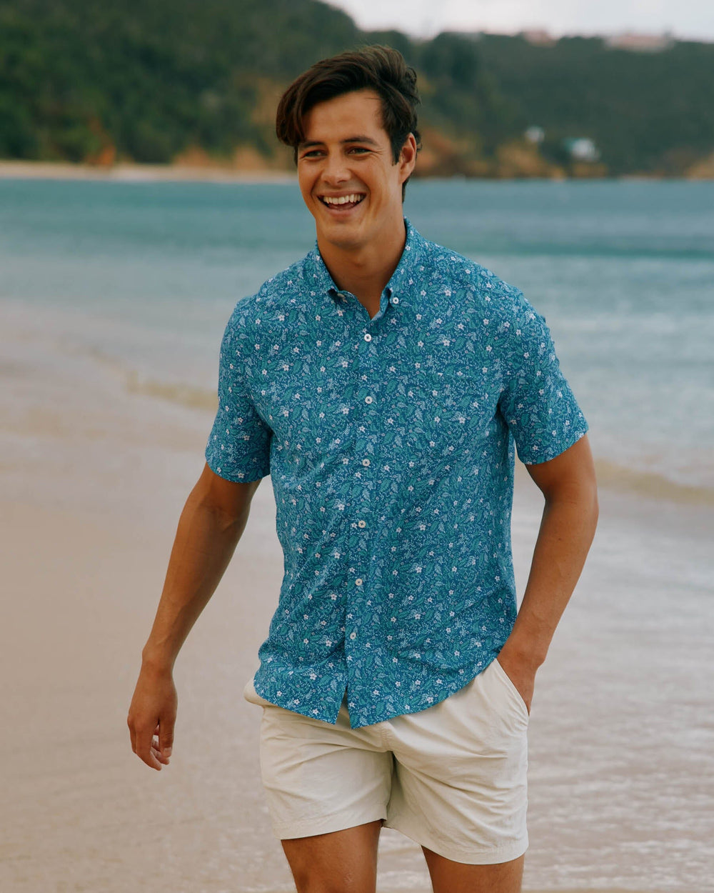The lifestyle view of the Southern Tide Barely Botanical Intercoastal Short Sleeve Button Down Shirt by Southern Tide - Atlantic Blue