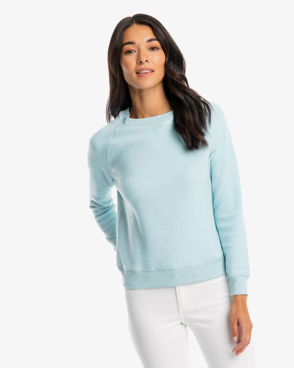 The model front of the Beachside Sun Farer Crewneck Sweatshirt from Southern Tide - Heather Wake Blue