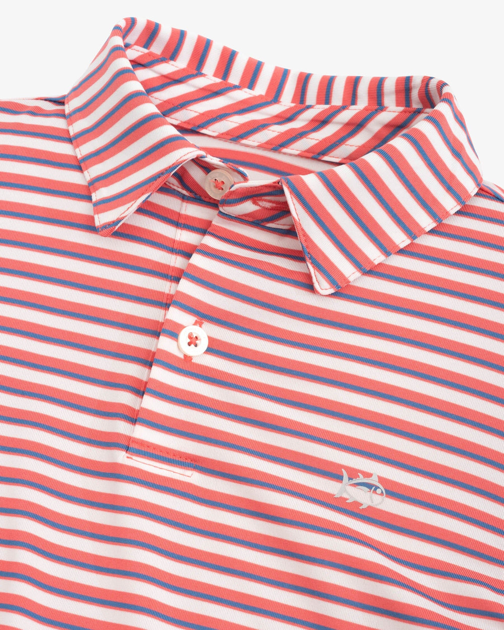 The detail view of the Southern Tide Boy's Driver Gulf Stripe Performance Polo Shirt by Southern Tide - Rosewood Red