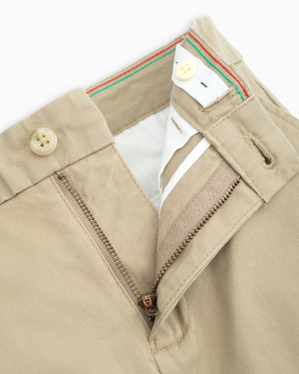 The detail view of the Boys Channel Marker Pant by Southern Tide - Sandstone Khaki