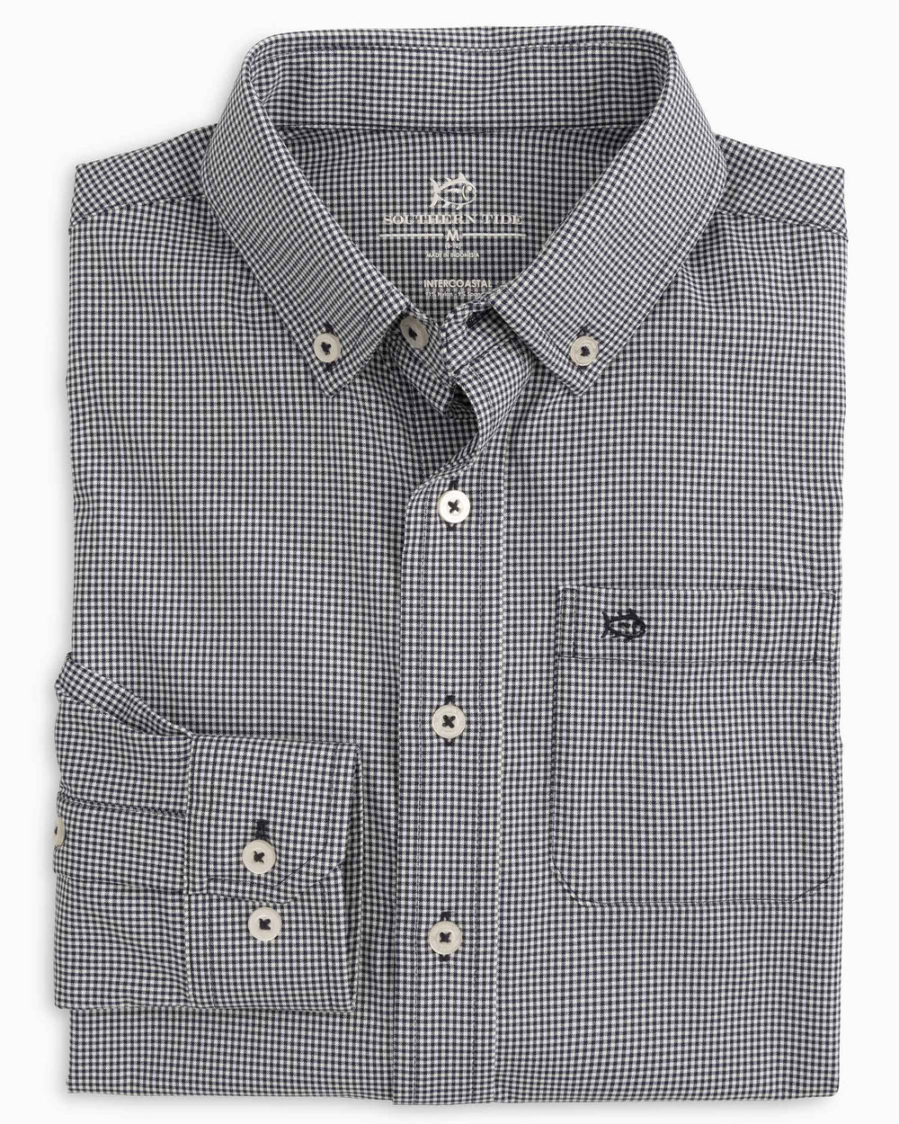 The folded view of the Boys Mini Gingham Intercoastal Button Down Shirt by Southern Tide - True Navy