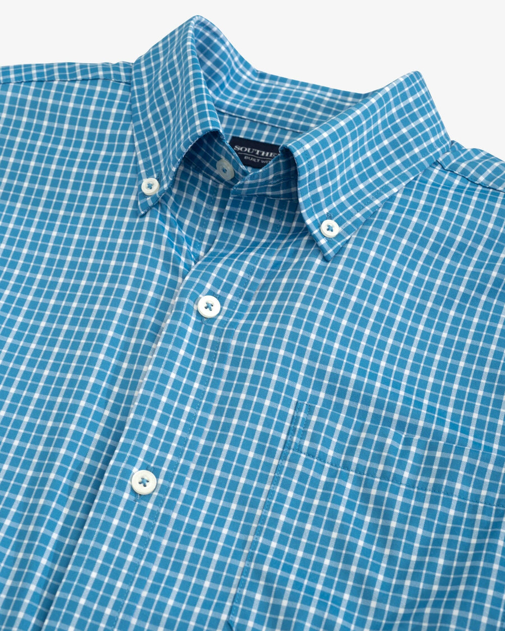 The detail view of the Southern Tide brrr Charleston Beaumont Plaid Intercoastal Sport Shirt by Southern Tide - Atlantic Blue
