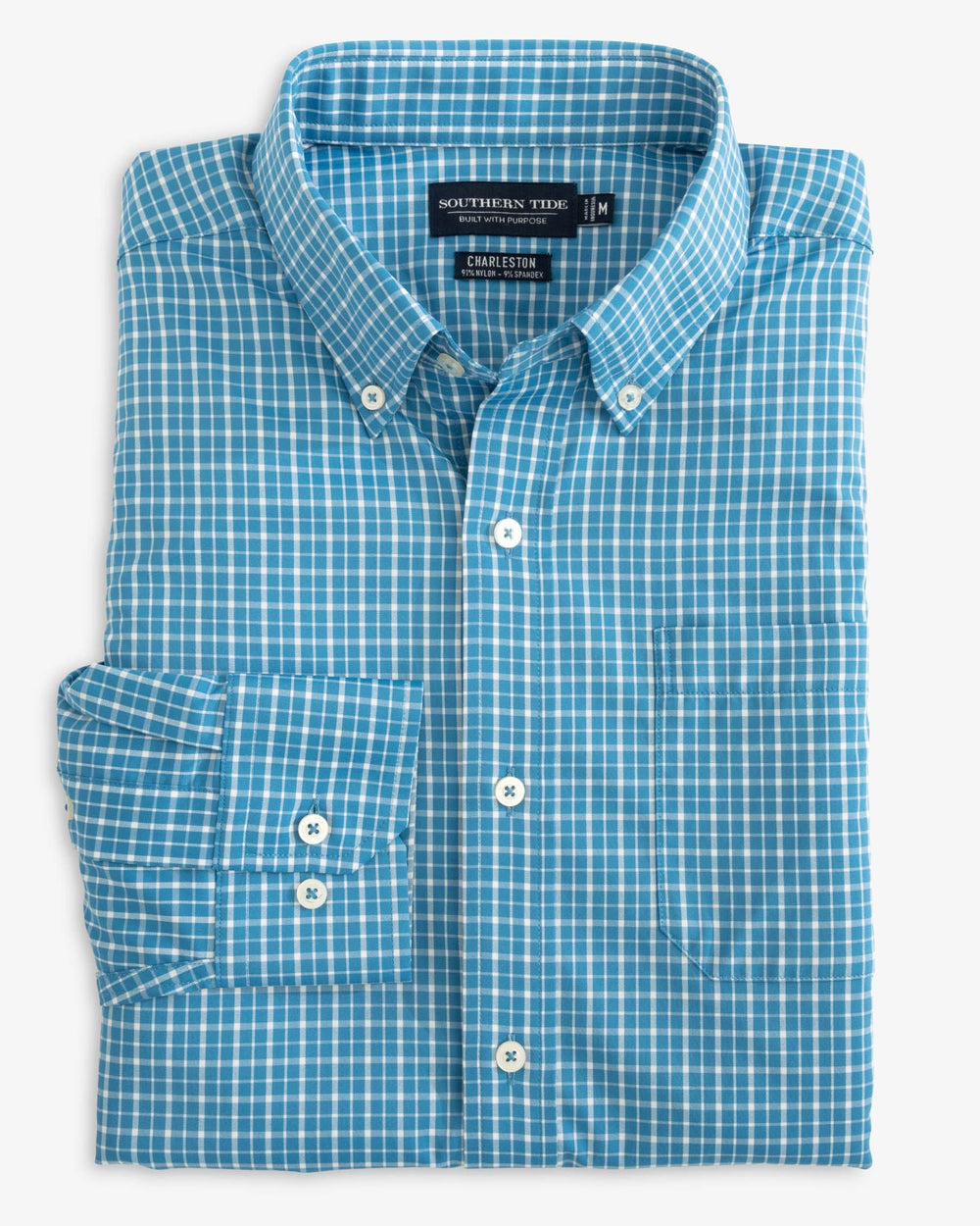 The folded view of the Southern Tide brrr Charleston Beaumont Plaid Intercoastal Sport Shirt by Southern Tide - Atlantic Blue