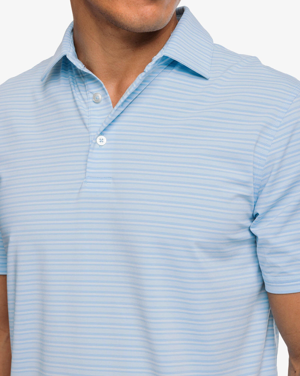 The detail view of the Southern Tide brrr°®-eeze Bowen Stripe Performance Polo Shirt by Southern Tide - Rain Water
