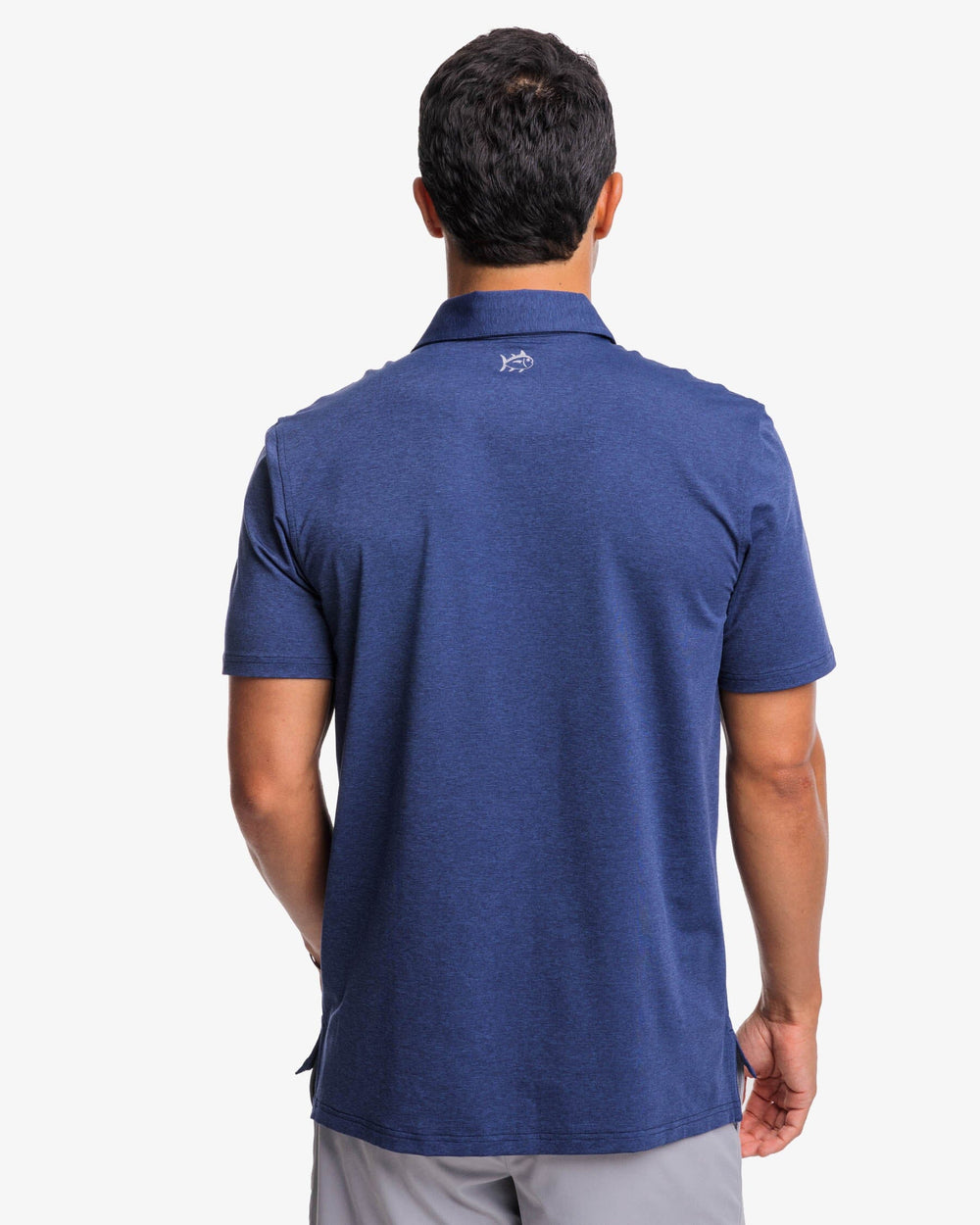 The back view of the brrr°®-eeze Heather Performance Polo Shirt by Southern Tide - Heather Nautical Navy