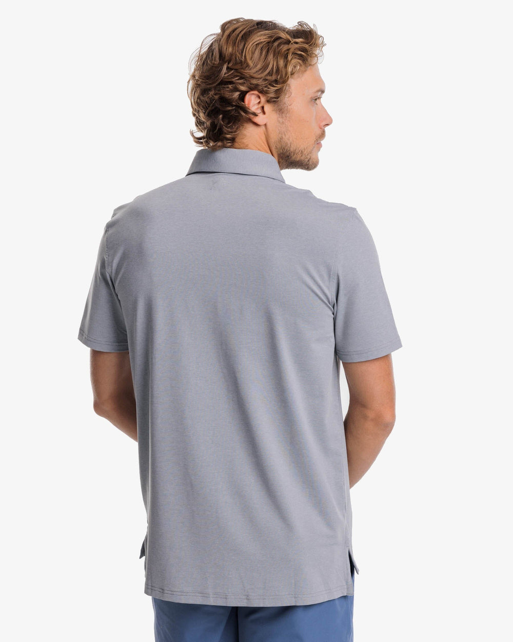 The back view of the brrr°®-eeze Heather Performance Polo Shirt by Southern Tide - Heather Steel Grey