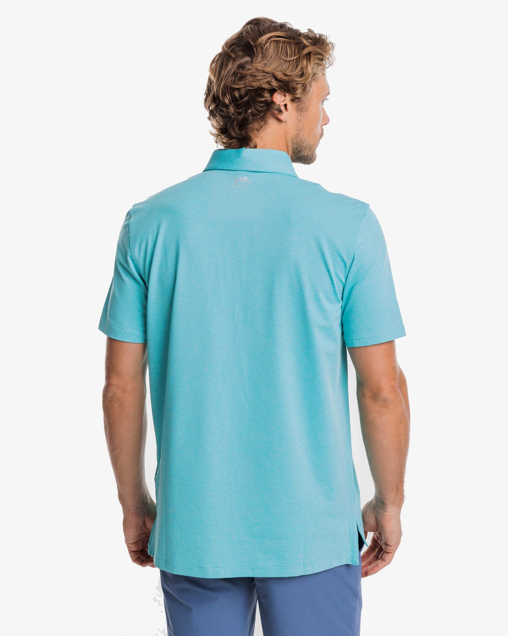 The back view of the brrr°®-eeze Heather Performance Polo Shirt by Southern Tide - Heather Tidal Wave