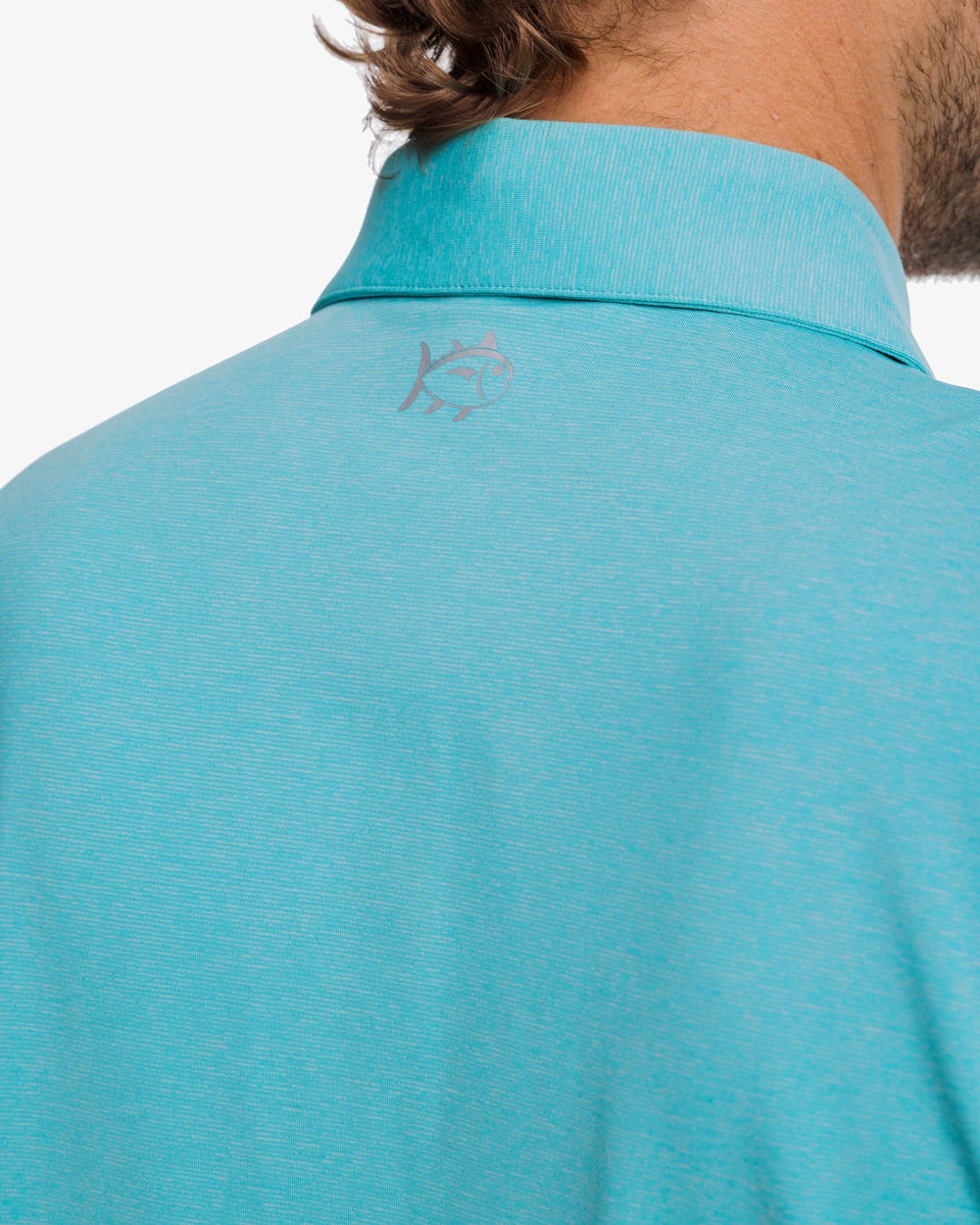 The yoke view of the brrr°®-eeze Heather Performance Polo Shirt by Southern Tide - Heather Tidal Wave