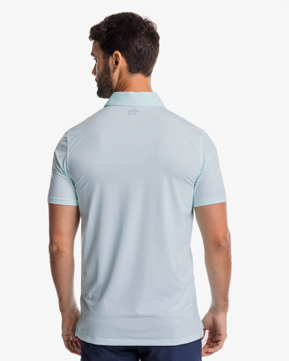 The back view of the Southern Tide brrr-eeze Millwood Stripe Performance Polo Shirt by Southern Tide - Baltic Teal