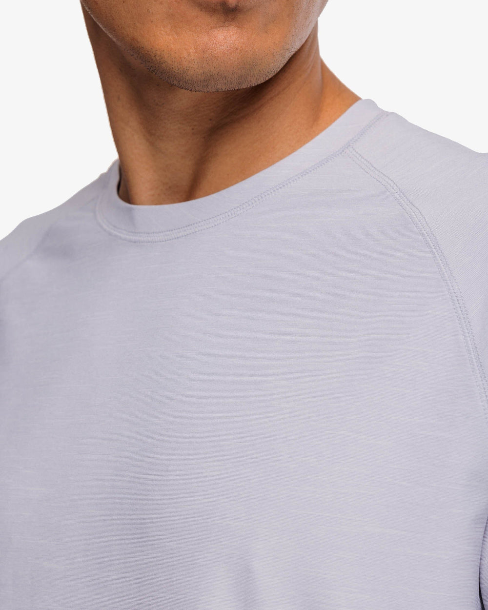 The detail view of the Southern Tide brrr-illiant Performance Long Sleeve Tee by Southern Tide - Platinum Grey