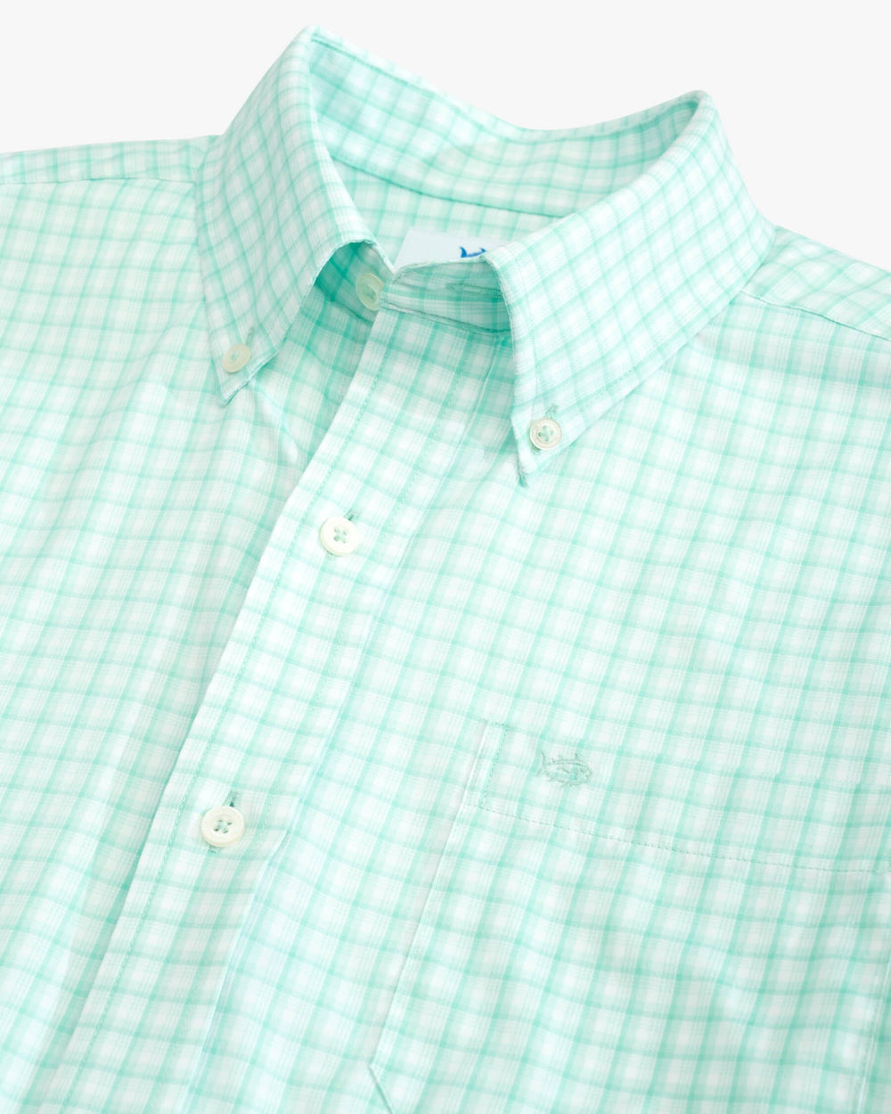 The detail view of the Southern Tide brrr Skycrest Plaid Intercoastal Sport Shirt by Southern Tide - Baltic Teal