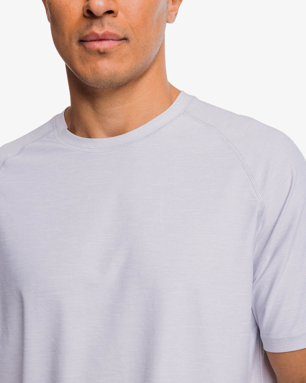 The detail view of the Southern Tide brrr°®-illiant Performance Tee by Southern Tide - Platinum Grey