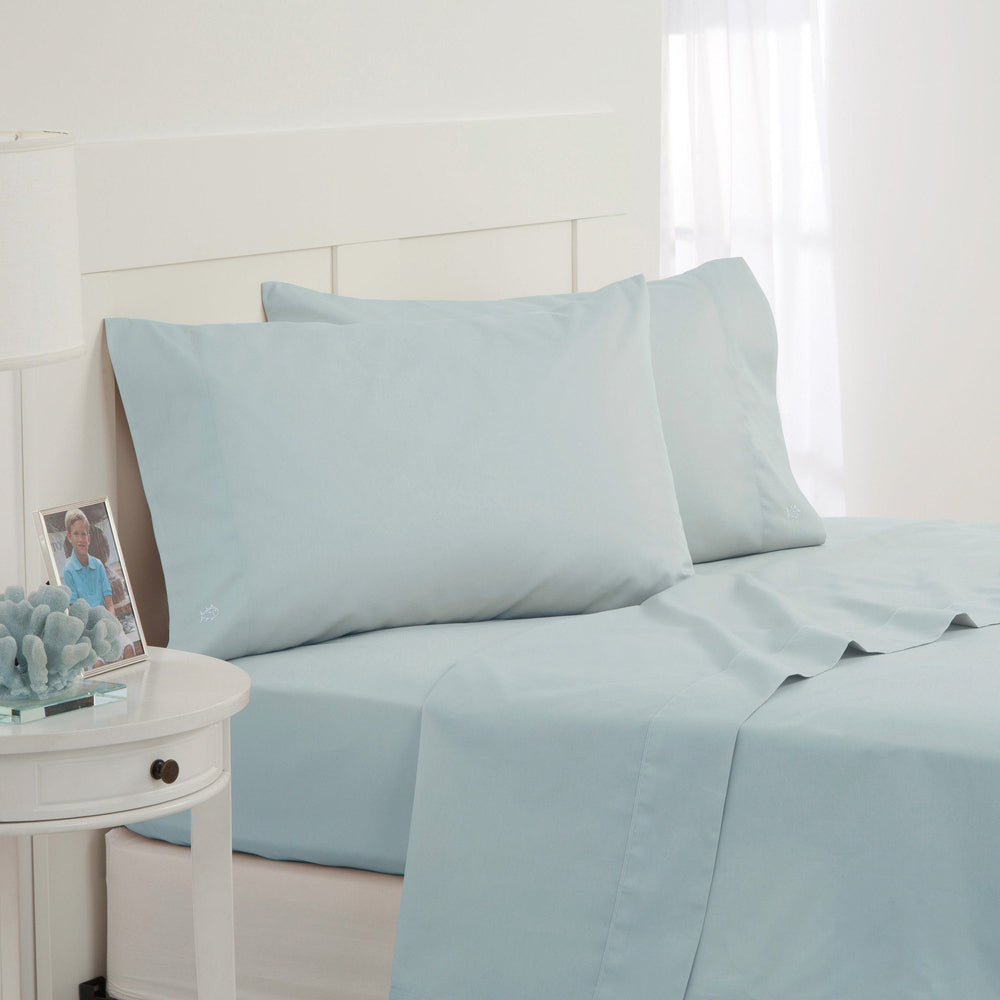 The angle front view of the Southern Tide Cotton Twill Sheet Set by Southern Tide - Sunlight Blue