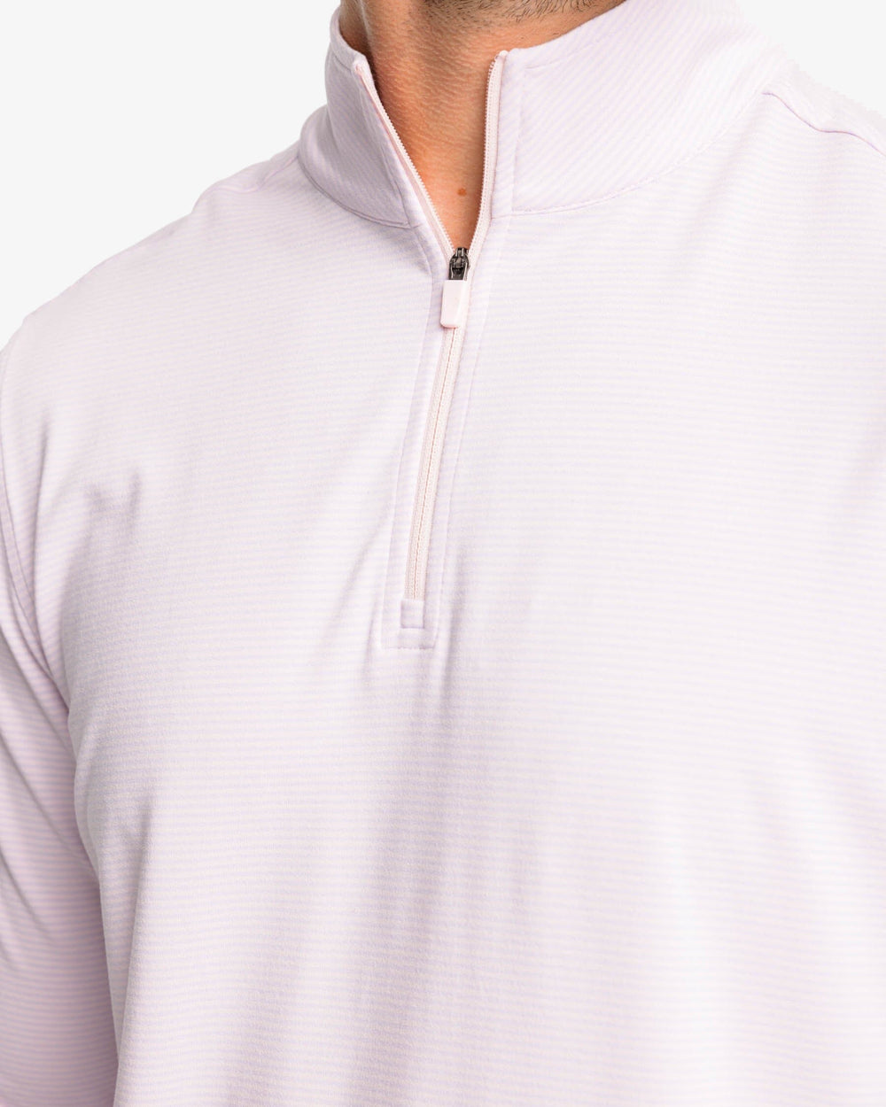 The detail view of the Southern Tide Cruiser Heather Micro-Stripe Performance Quarter Zip by Southern Tide - Heather Rose Blush