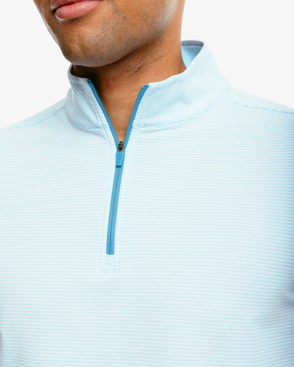 The detail of the Men's Cruiser Heather Micro Striped Performance Quarter Zip Pullover by Southern Tide - Heather Aquamarine