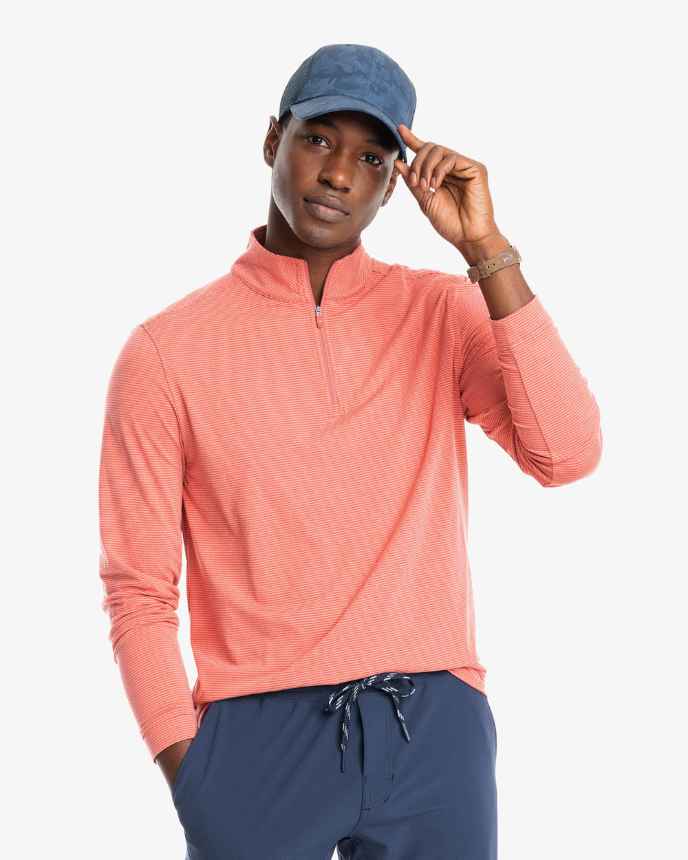 The model front view of the Cruiser Heather Micro Striped Performance Quarter Zip Pullover by Southern Tide - Heather Mineral Red