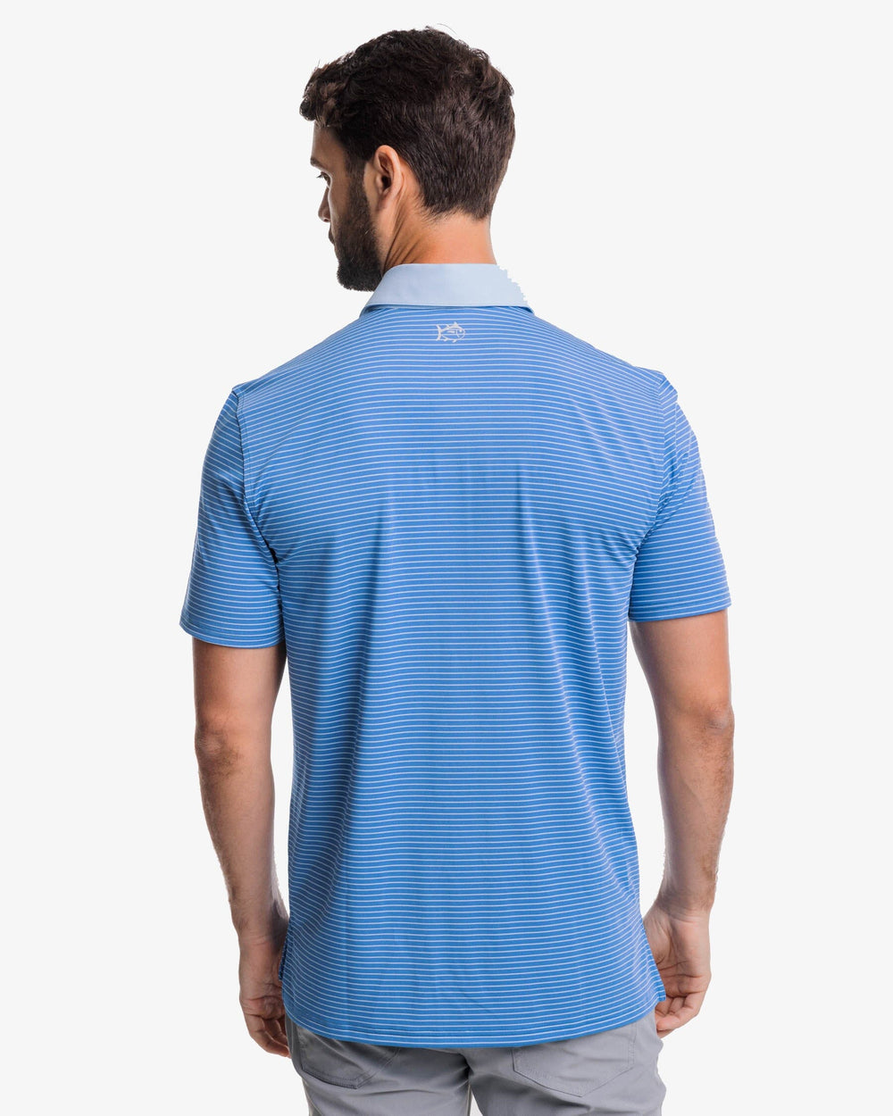 The back view of the Southern Tide Driver Bowee Stripe Performance Polo Shirt by Southern Tide - Atlantic Blue