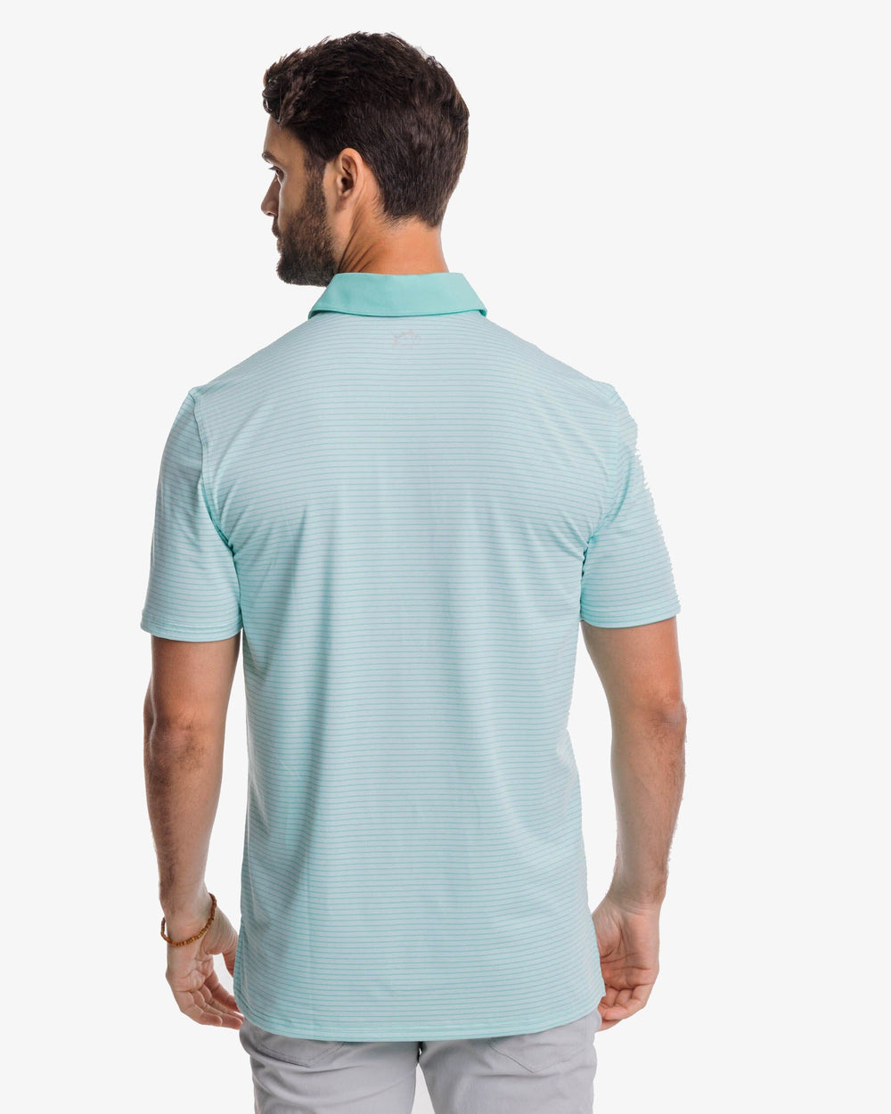The back view of the Southern Tide Driver Bowee Stripe Performance Polo Shirt by Southern Tide - Baltic Teal