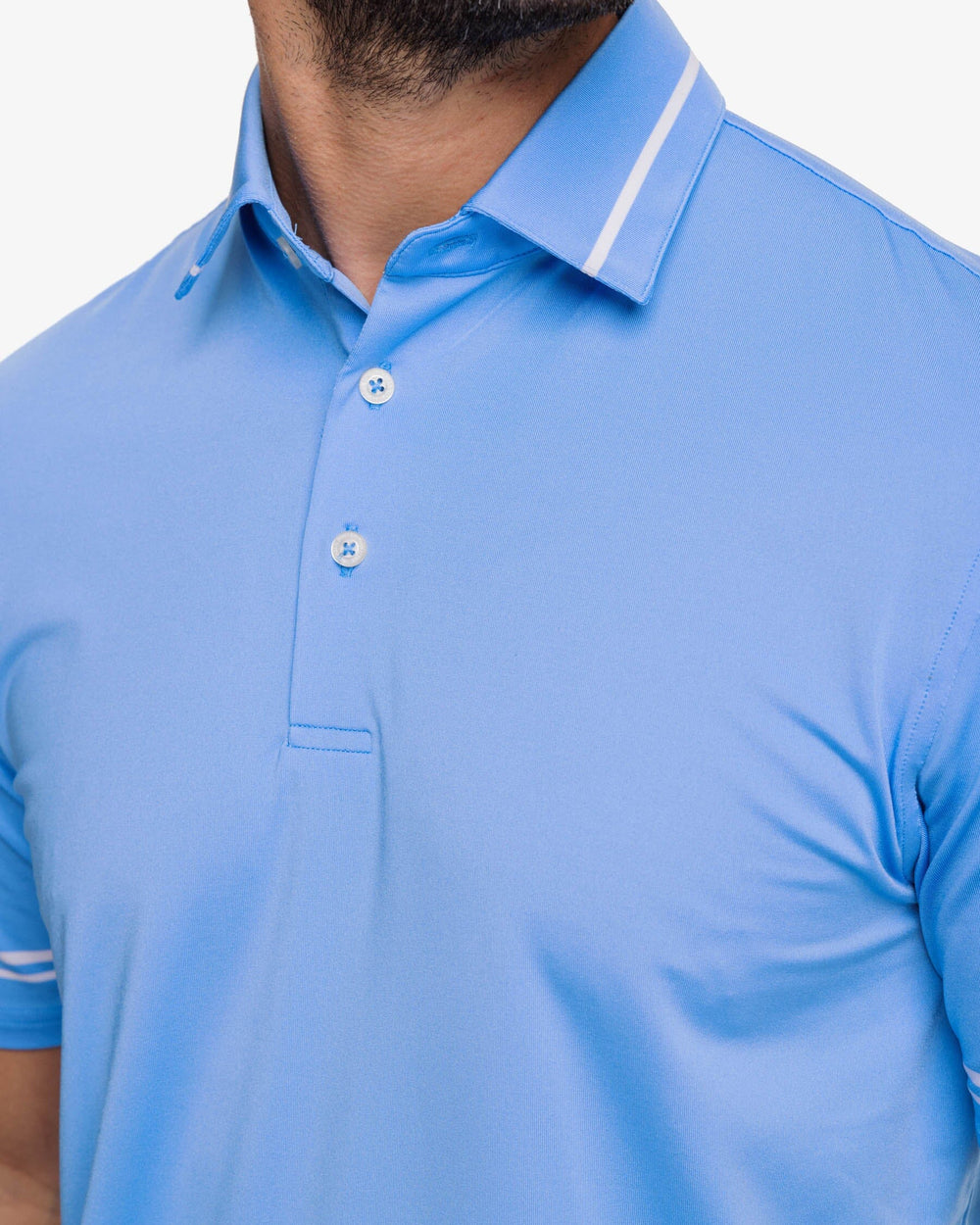 The detail view of the Southern Tide Driver Brantley Stripe Performance Polo Shirt by Southern Tide - Boat Blue