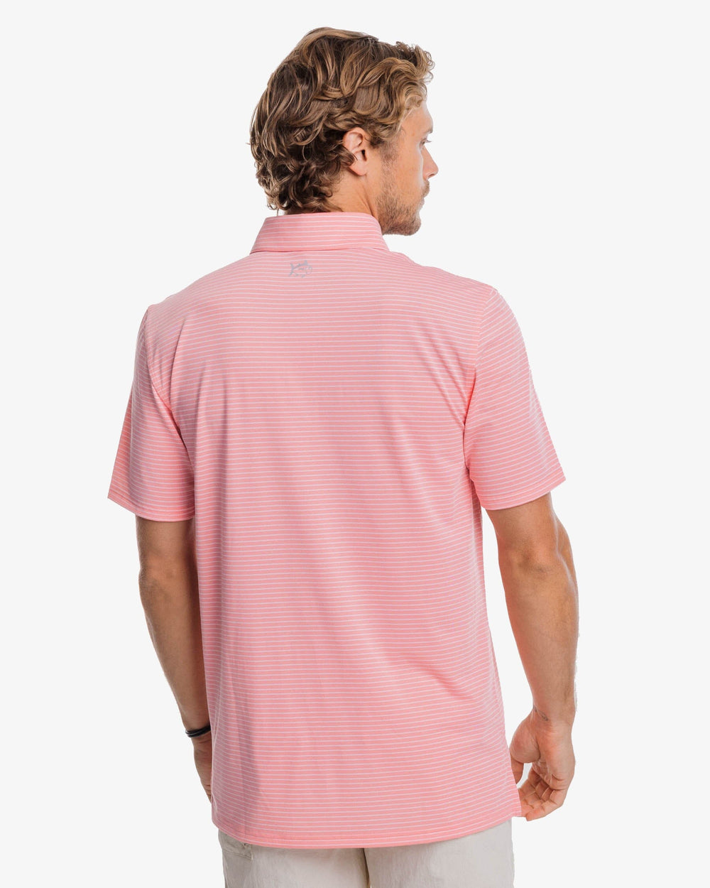 The back view of the Southern Tide Driver Mayfair Performance Polo Shirt by Southern Tide - Flamingo Pink
