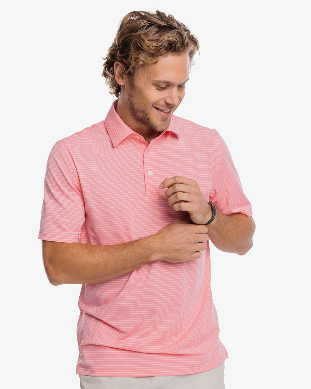 The front view of the Southern Tide Driver Mayfair Performance Polo Shirt by Southern Tide - Flamingo Pink