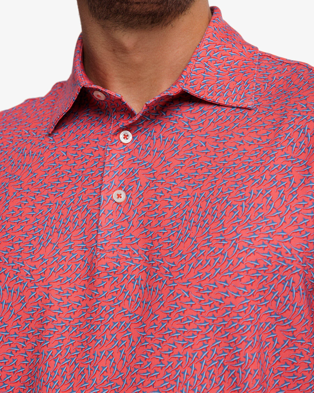 The detail view of the Southern Tide Driver Stay in Schools Polo Shirt by Southern Tide - Rosewood Red